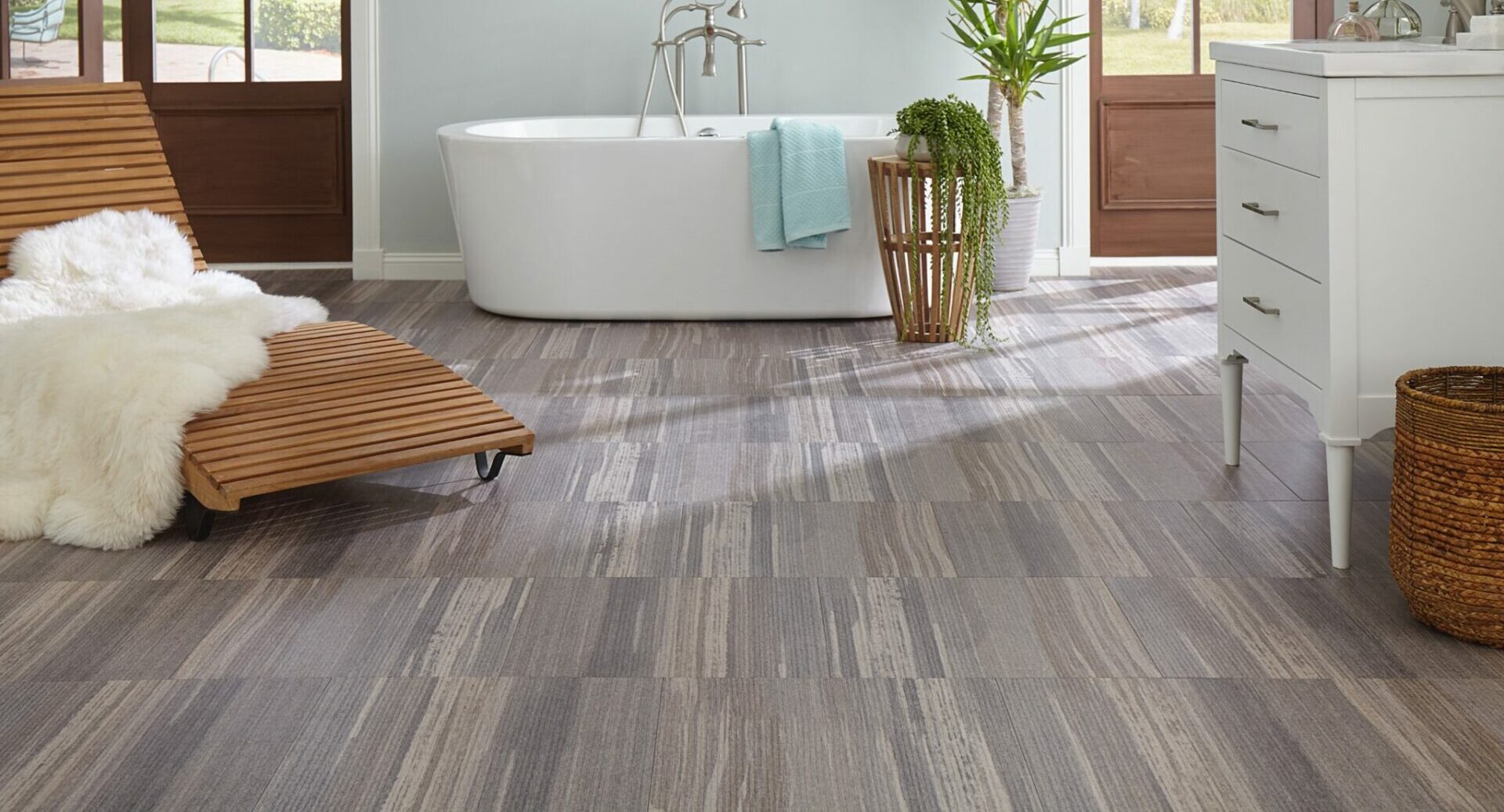 A bathroom with vinyl flooring