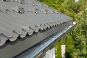 Metal half-round gutters on a house.