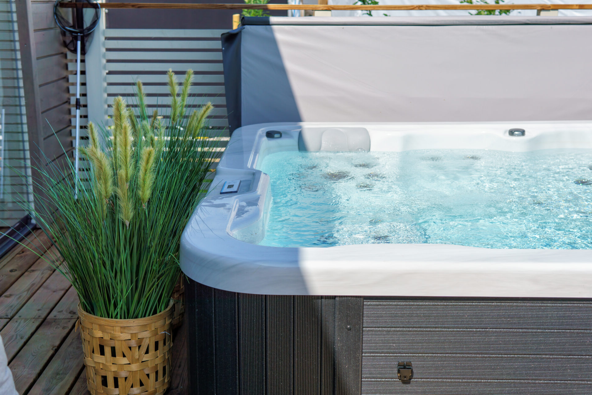 Luxurious hot tub on the backyard terrace.