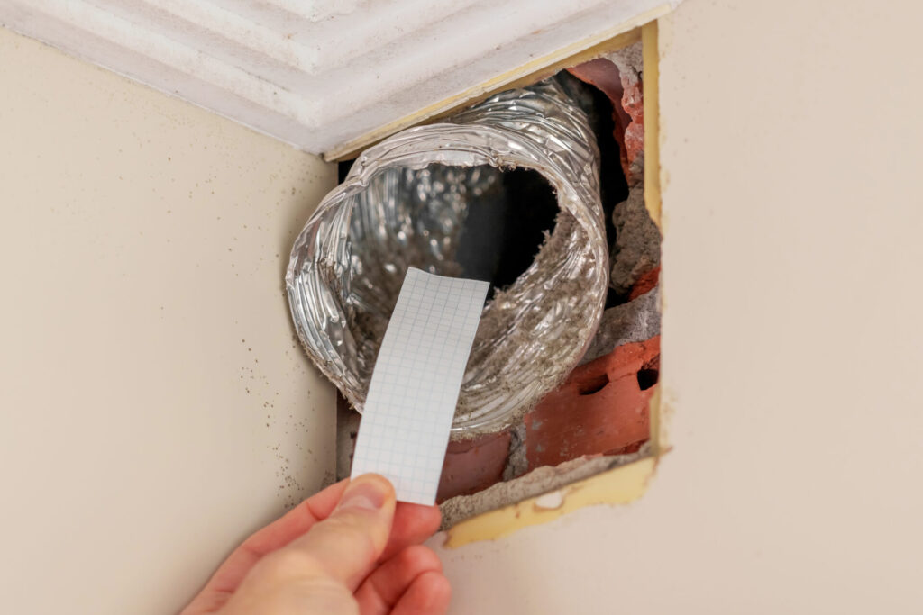Technical maintenance checking of ventilation air flow in the room. 