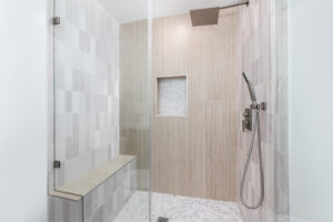A custom walk-in shower with built-in bench