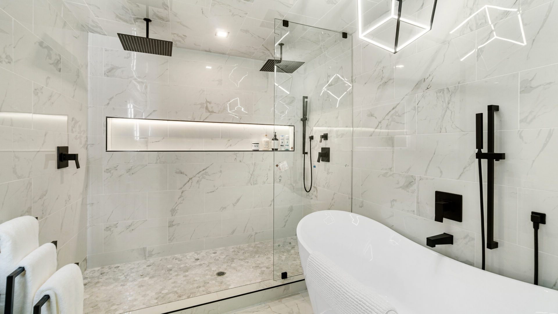 Bright modern bathroom with shower and bathtub.