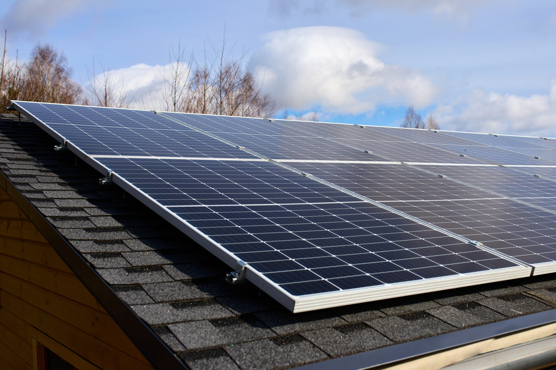 solar panel modules installed on a shingle roof