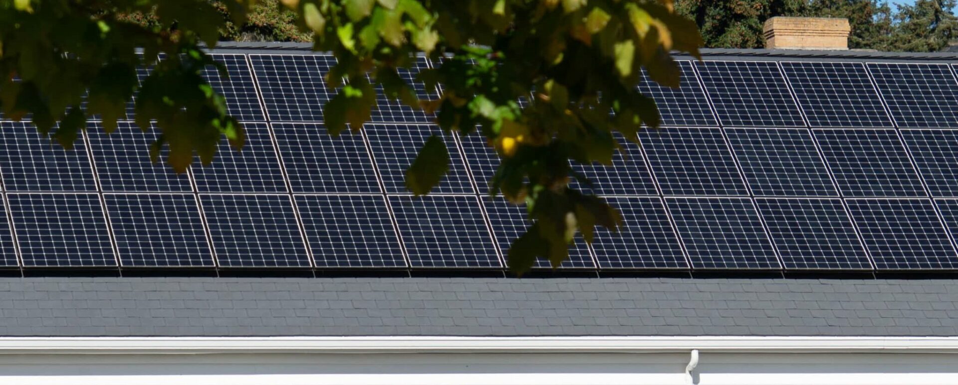 new construction white house with solar panels