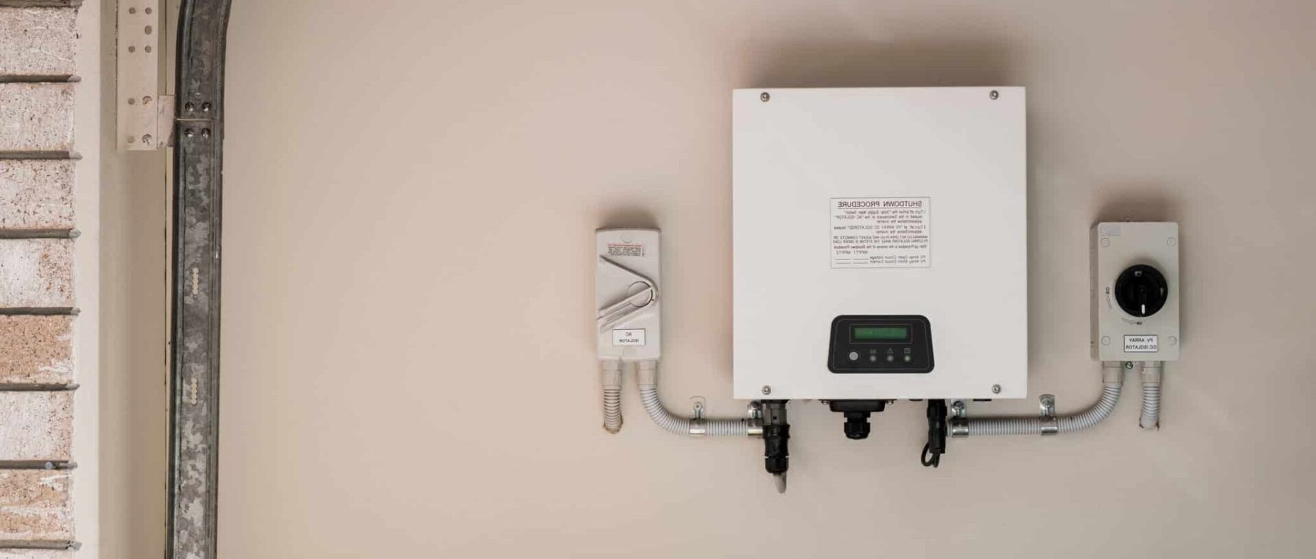 solar inverter on the side of a house