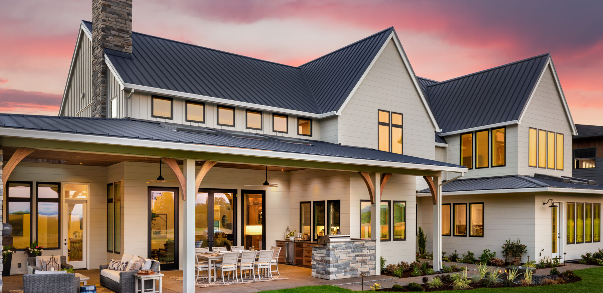 New luxury home exterior at sunset