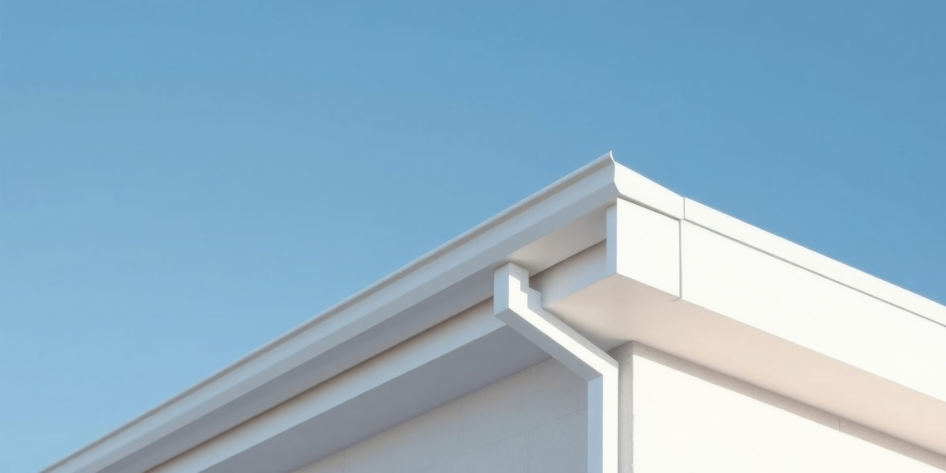 Close-up on white K-style gutter system.