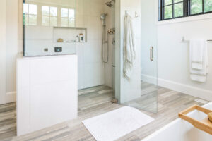Walk-in shower tub combo in a modern farmhouse-style bathroom