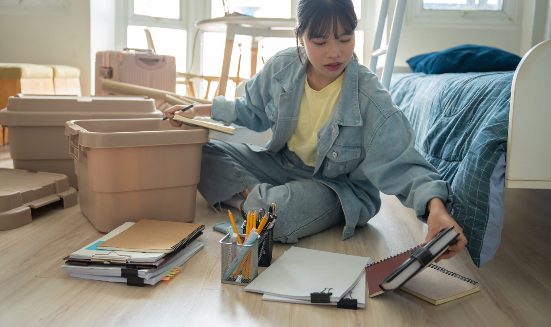 Student unpacking their boxes at college