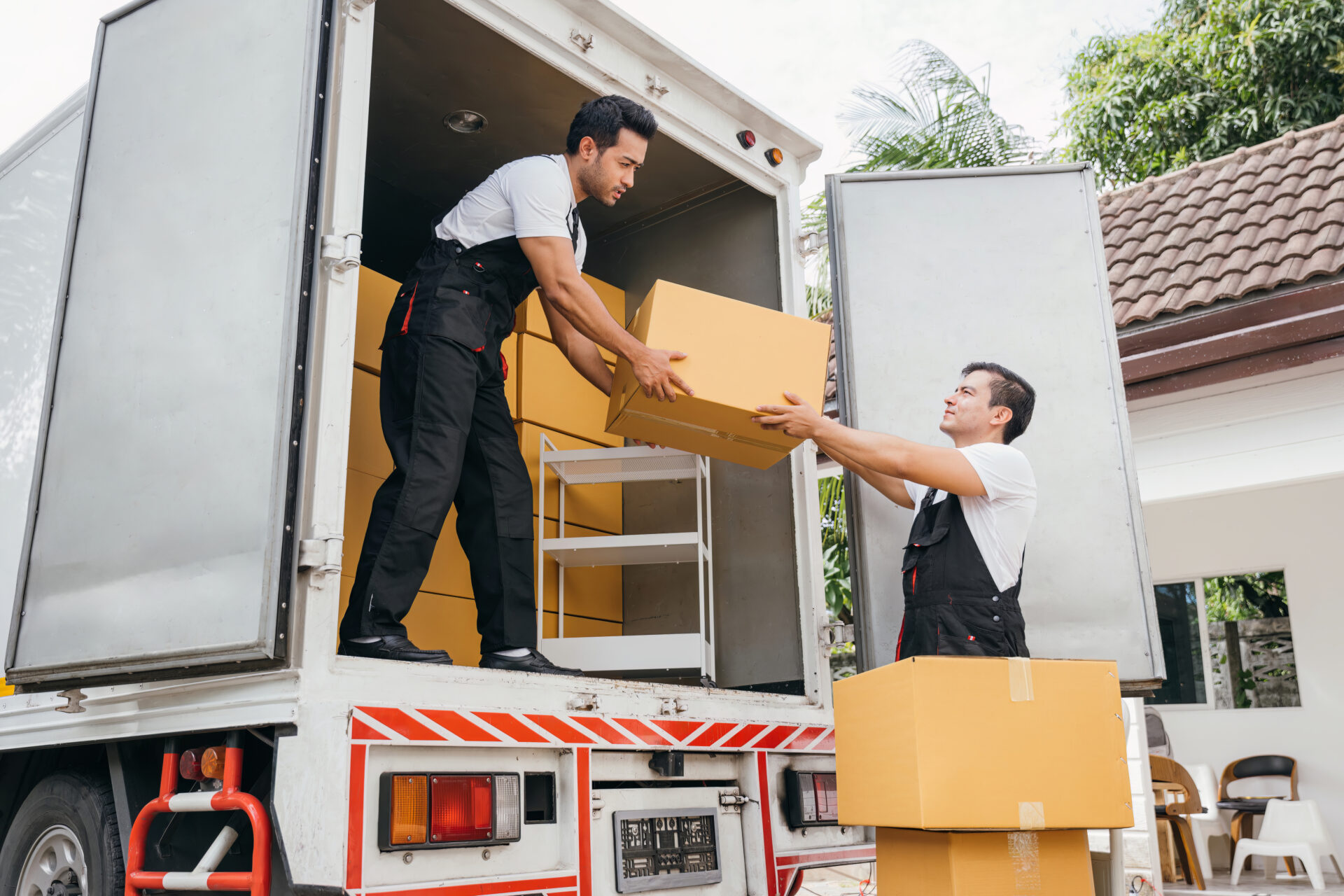 professional movers loading a moving truck