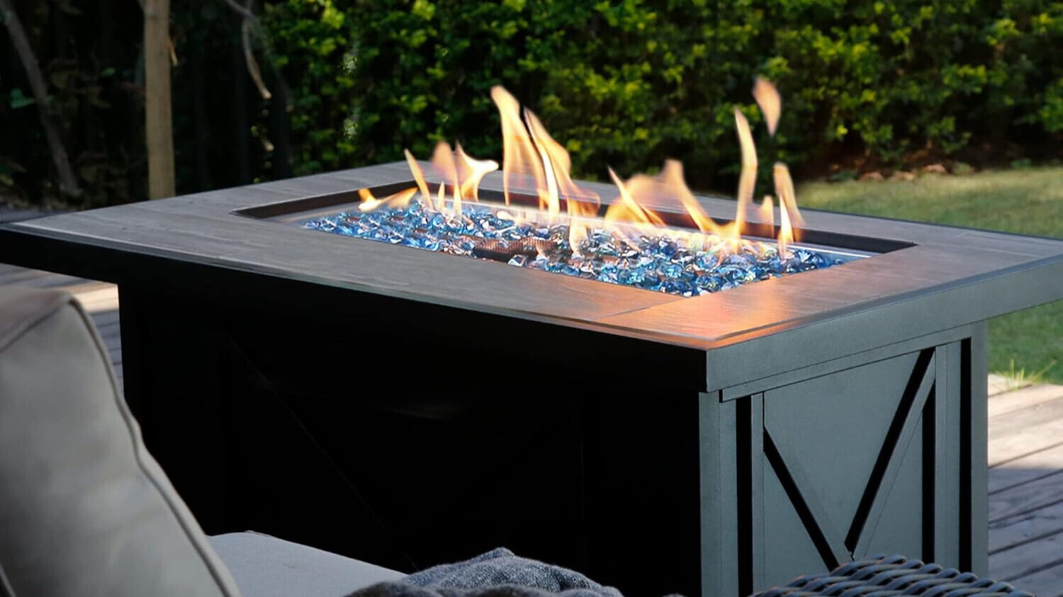 Propane fire pit table on a cozy patio