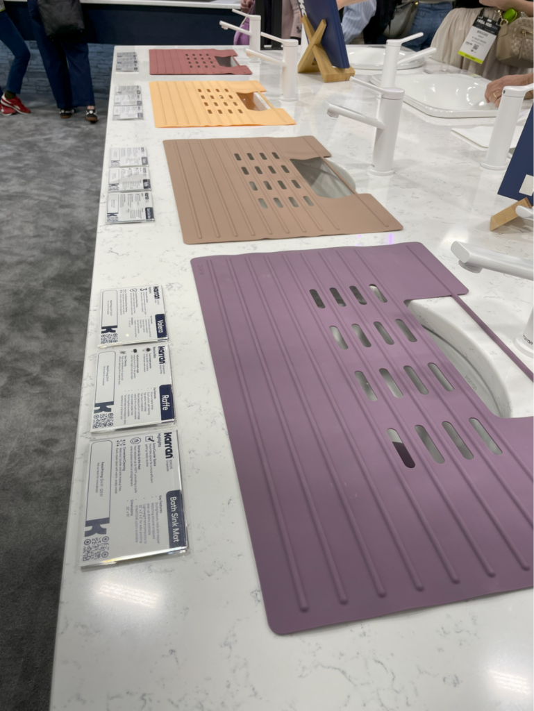 Popular and practical kitchen accessories like sink covers featured muted but irreverent colors at the 2025 International Builders Show.