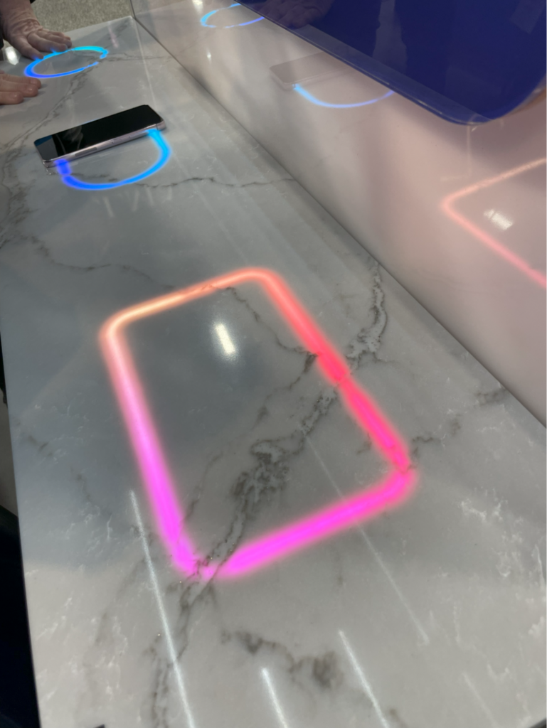 Kitchen accessories highlighted at the 2025 International Builders Show included embedded wireless chargers that add a splash of color to the countertops.