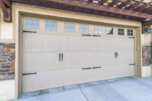 Modern garage door of a beautiful house on a sunny day.