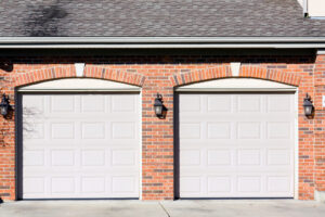 Two car garage with white doors.