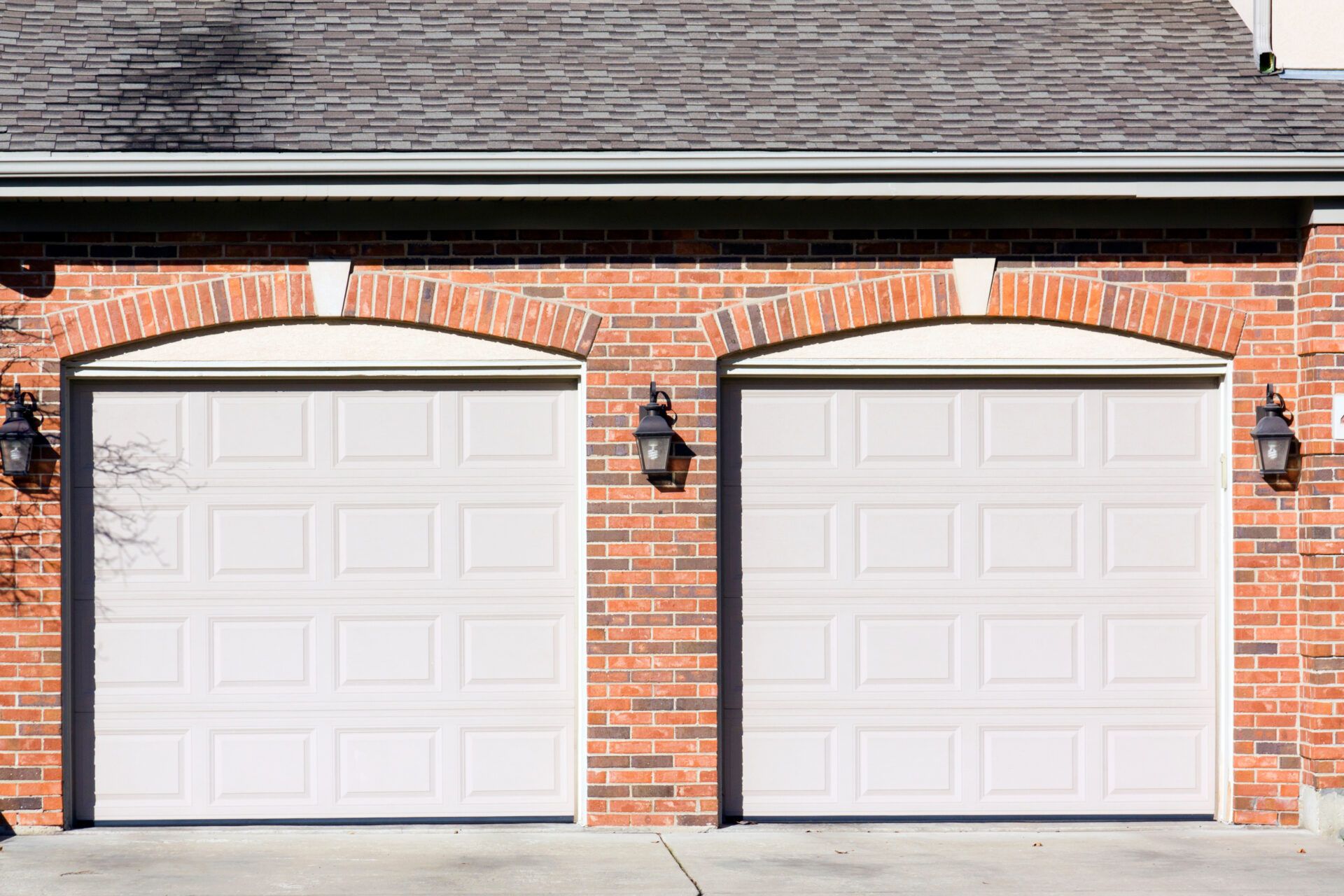 Two car garage with white doors.